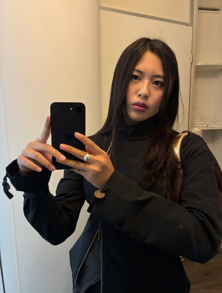 Haein Jung taking a mirror portrait